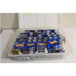 HOT WHEELS RUBBERMAID CONTAINING 70+ MINT ON BOARD EARTH MOVERS, FORK LIFTS, CEMENT TRUCKS, ETC