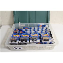 HOT WHEELS RUBBERMAID CONTAINING 80+ MINT ON BOARD VANS, TRUCKS AND 4X4'S