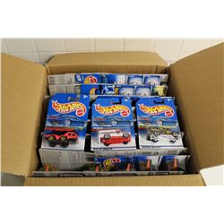 HOT WHEELS FACTORY BOX CONTAINING48 MINT ON BOARD FIRE TRUCKS, RESCUE TRUCKS ETC.