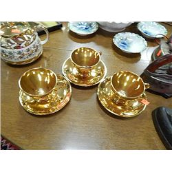 GOLD TEA CUPS & SAUCERS - 3