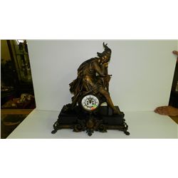 antique bronze? clock with knight kneeling with sword on marble base, cond G, one rear foot replaced