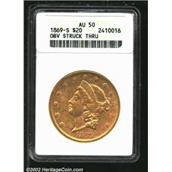 1869-S $20 Double Eagle--Obverse Struck Through--AU50 ANACS.