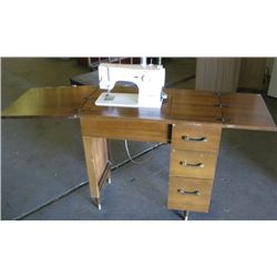 Elna Brand Sewing Machine and 3 Drawer Table,