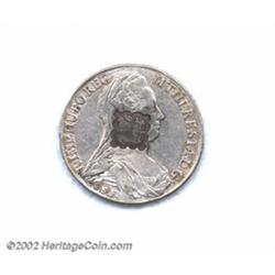 Scalloped square with an Arabic inscription counterstamped on an Austria Maria Theresa taler,