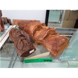 Three wood carvings