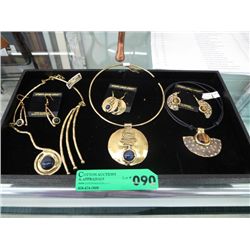 Three necklace and earring sets