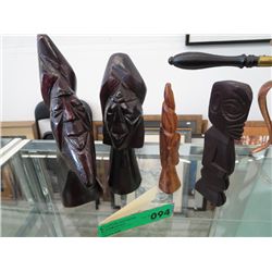 Four wood carvings