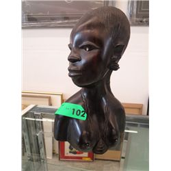 Carved bust of an African woman