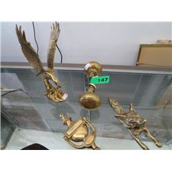 Four pieces of brass