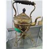Image 1 : Brass teapot over a heating unit