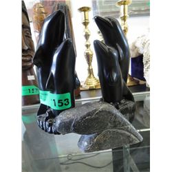 Three carvings