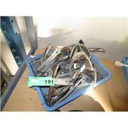 Tray of metal clamps