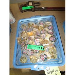 Tray of 2010 souvenir buttons