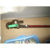 Image 1 : A large pipe wrench