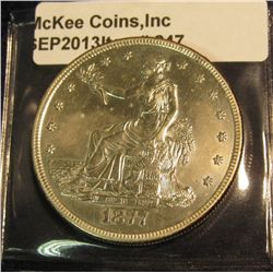 247. 1877 S U.S. Silver Trade Dollar. AU 50.