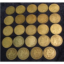 1511. (24) Old U.S. Silver Dollars grading up to AU. Includes 1879S, 81S, 82 O, 84 O, 88 O, 99 O, (1
