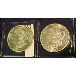 1512. (2) 1921 D Morgan Dollars. Brilliant Unc.