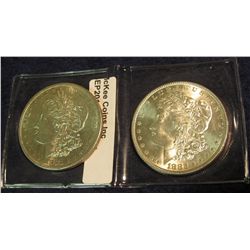 1516. 1882 P Brilliant Unc & 82S AU55 Morgan Silver Dollars.