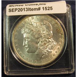 1525. 1883 O Morgan Silver Dollar. Gold toned MS 64.