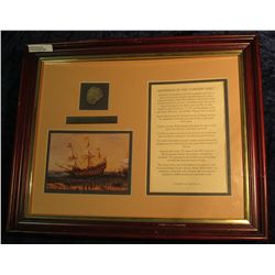 1539. Large framed case with a Silver Piece of Eight from the Shipwreck of the "Vliegent Hart", whic