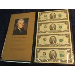 1542. Uncut Sheet of Four Series 2003 $2 Federal Reserve Notes in a folder. CU.