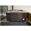 Image 1 : 84" X 84" CAL SPAS DIAMOND SERIES HOT TUB WITH CINNABAR INTERIOR AND PREFERRED SMOKE CABINET.