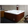Image 1 : 84" X 84" CAL SPAS HOT TUB WITH SNOW WHITE INTERIOR AND PREFERRED MAHOGANY CABINET.