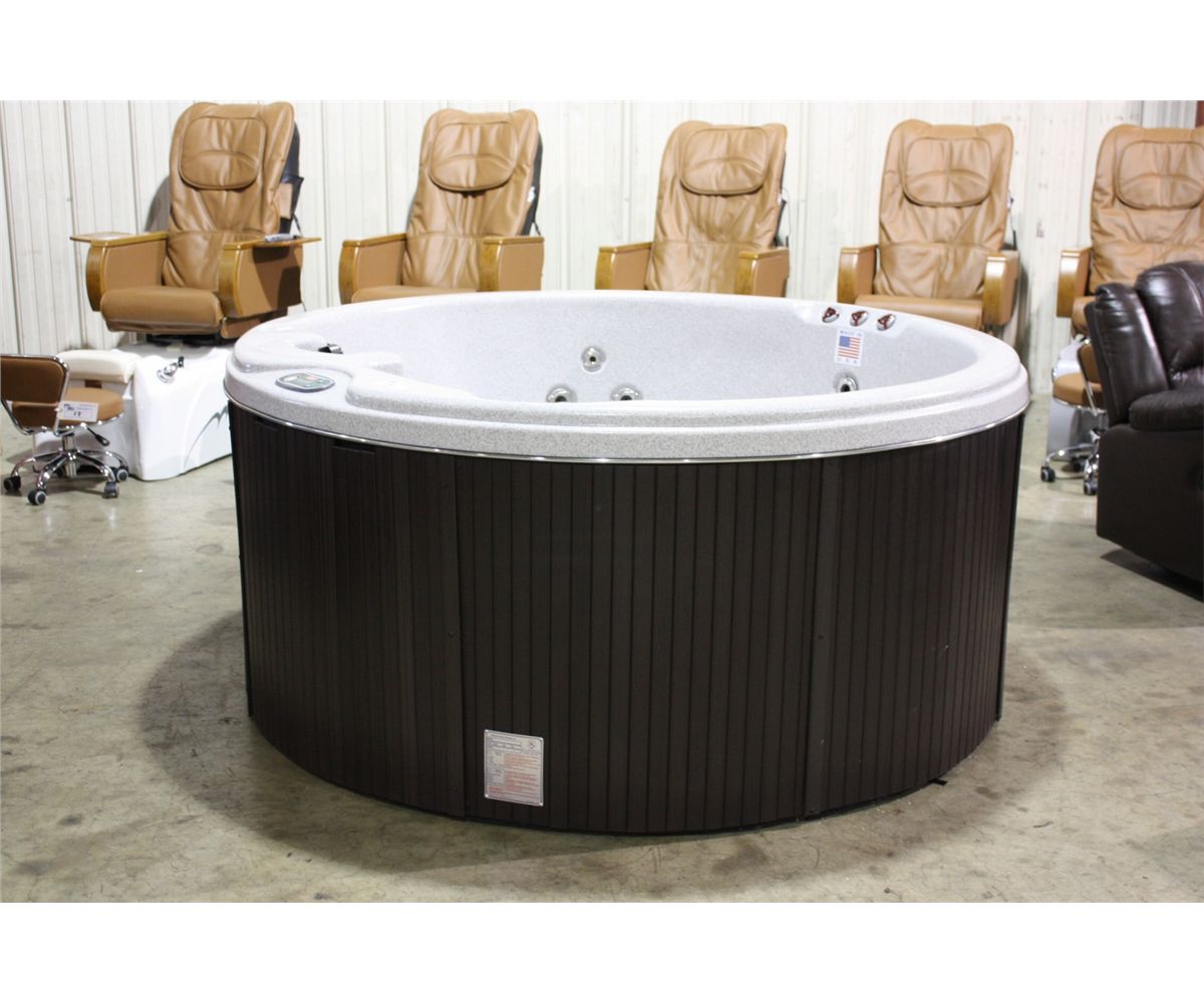 78 ROUND CAL SPAS COLEMAN SERIES HOT TUB WITH SAHARA INTERIOR AND PREFERRED SMOKE CABINET. best coleman hot tub
