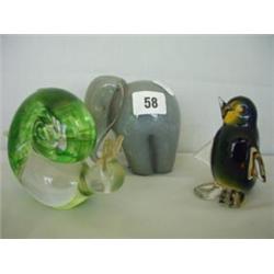 Three animal paperweights to include Wedgwood elephant and snail plus penguin £40 - 60...