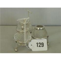 Victorian silver trefoil shaped cruet set in the manner of Christopher Dresser, Birmingham 1884 £...