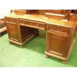 Continental Chippendale style desk with panelled sides and bun feet £800 - 1200...