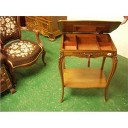 19th century walnut sewing table on carved cabriole legs £300 - 400...