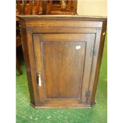 Early 19th century oak corner cupboard with shaped interior £200 - 300...