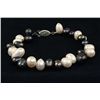 Image 1 : 116.38CTW 7" BLACK-WHITE FRESHWATER PEARL BRACELET