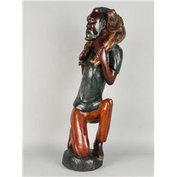 Wood Carving of Asian Man