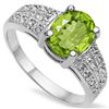 Image 1 : 7X9MM OVAL PERIDOT & DIAMOND ACCENT SILVER RING