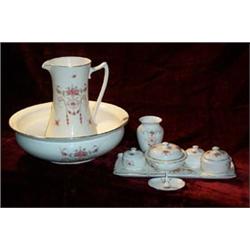 CROWN DUCAL 9 PIECE VANITY SET comprising of washbowl and jug, three pots, soapdish etc. C1920's....