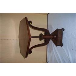 EDWARDIAN MAHOGANY OCCASIONAL TABLE, with open scrolled supports on triangle base, with raised ce...