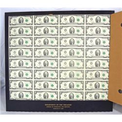 UNCUT SHEET OF 32 1995 $2.00 FEDERAL RESERVE NOTES, IN BLACK TREASURY HOLDER