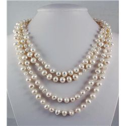 PRETTY WHITE 695.00CTW FW PEARL NECKLACE W/ BOTTON LOCK