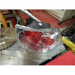 VEHICLE TAIL LIGHT HOUSING