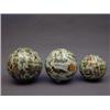 Image 1 : A graduated pair of Victorian glass spheres, internally decorated with nursery type scraps, 19cm...