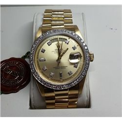 Mens Rolex Presidential, 18kt Yellow Gold with diamond bezel and diamond markers. Custom diamond bez