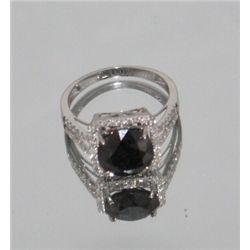 Black diamond Ring with 3.56CT.Black diamond Cntr, natural diamonds surround. 14kt gold. Retails $6,