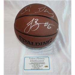BASKETBALL HAND SIGNED BY MIAMI HEAT PLAYERS: LEBRON JAMES, DWYANNE WADE & CHRIS BOSH