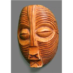 A RARE LEGA IVORY MASK, DEMOCRATIC REPUBLIC OF THE