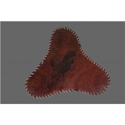 Antique Leather Horse Saddle with engraving of a bird.