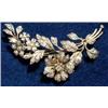 Image 1 : A Victorian white gold floral spray diamond set en tremblant brooch (one stone missing)  (see ill...