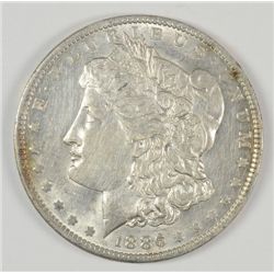 1886-O MORGAN SILVER DOLLAR, AU-58  CLEANED