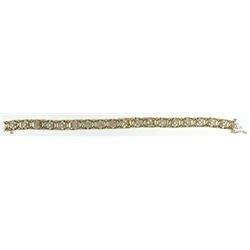 Pre-owned 10k yellow gold diamond "X" & "O" bracelet, 7" long